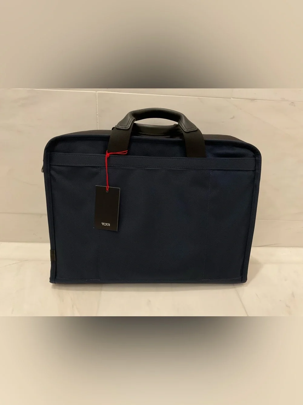Tumi up sale